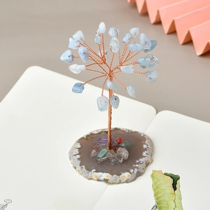 Miniature blue crystal money tree with copper wire on a natural agate slice base