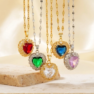 Elegant heart pendant necklace with colorful cubic zirconia on premium silk background