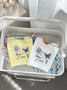 Détails des mini sacs en tissu Oxford brodé avec poignées en corde tressée