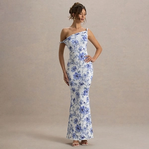 Detail of blue and white floral one-shoulder knot on the slim-fit maxi dress