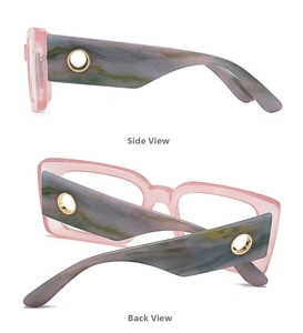 Detail view of pink translucent frames with marble textured wide temples and gold accents