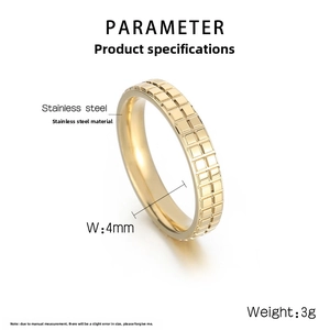 Macro detail of 4mm gold-plated checkered stainless steel ring with 3g weight specifications