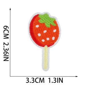 Macro detail of strawberry popsicle embroidery patch showing stitch texture and 6x3.3cm size