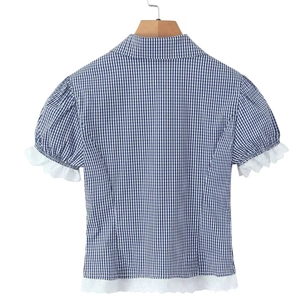 Back view of blue plaid shirt with white lace trim and short sleeves on a wooden hanger