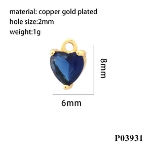 Detail view of 18K gold plated heart pendant with blue cubic zirconia and measurements