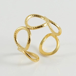 Macro shot of 18k gold plated multi-layer hollow ring with twisted rope texture detail
