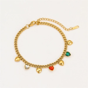 Detailed macro view of gold-plated stainless steel chain bracelet with colorful heart charms