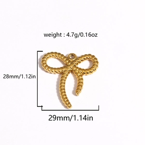 Detailed view of golden bow pendant with dimensions 28mm x 29mm and 4.7g weight info