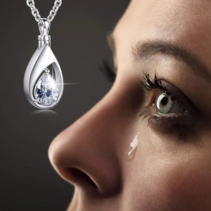 Elegant teardrop necklace with pear-cut crystal pendant on minimalist silver chain