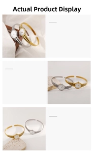 Detail view of gold and silver vintage watch bracelets with textured metal straps
