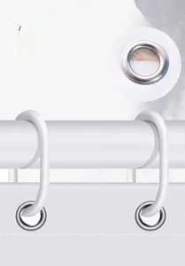 Detail of rust-proof stainless steel eyelets and C-shaped hooks on a white shower curtain