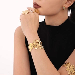 Exaggerated 18K gold plated hollow flower texture wide bangle and ring jewelry set