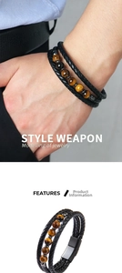 Detail of multi-layer woven leather bracelet with tiger eye beads and magnetic clasp