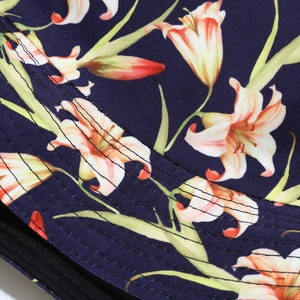 Detail of multi-row stitching on the brim of a navy blue floral lily sun bucket hat