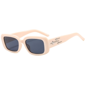 Fashionable beige rectangle sunglasses with dark gray lenses and silver star decorations