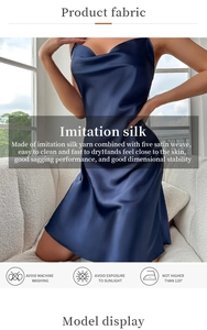 Detail of dark blue silk-like nightgown fabric featuring a smooth satin finish and texture