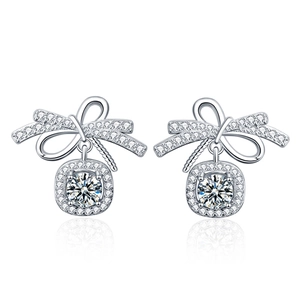 Elegant 925 sterling silver bow knot stud earrings with shimmering moissanite stones
