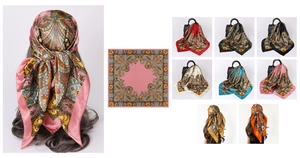 Macro detail of vintage paisley satin scarf showing premium fabric texture and color patterns