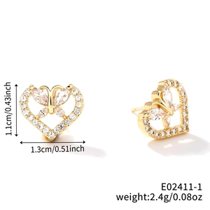Detail showing heart-shaped gold studs with zircon butterflies and 1.1cm x 1.3cm size scale