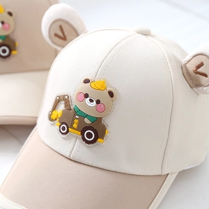 Kids beige baseball cap featuring cartoon bear truck patch and cute plush ears