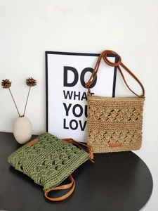 Handmade hollow paper rope straw bags in khaki and green with leather shoulder straps