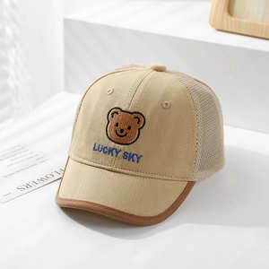 Detail of baby baseball cap featuring lucky bear embroidery and breathable mesh panel