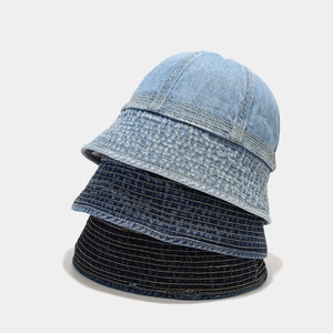 Detailed close-up showing light, deep, and navy blue denim washed bucket hat textures