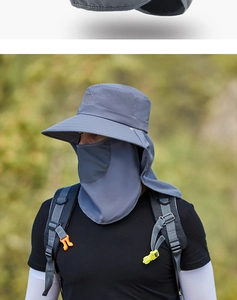 Detail of grey sun hat showing breathable face mask and long neck flap for outdoor protection