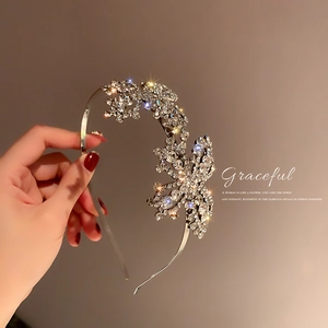 Silver fashion headband with sparkling rhinestones and butterfly design for women