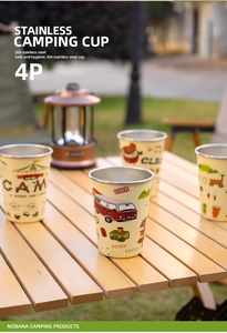 Detail of 4-piece 304 stainless steel camping cup set on a wooden outdoor table