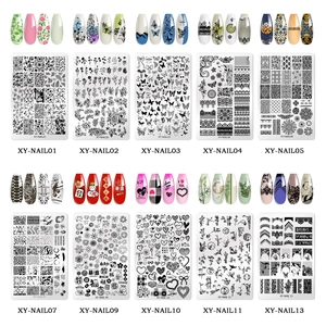 Set di 10 piastre per stamping nail art con motivi floreali, farfalle e pizzo delicato