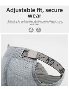 Detail of light grey mesh baseball cap with adjustable graffiti strap and silver metal buckle