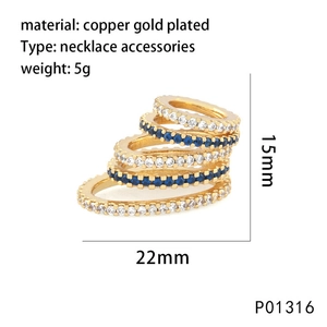 Copper gold plated layered pendant with blue and clear zircon stones measuring 15x22mm