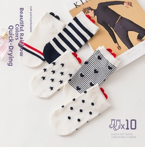 Detailed set of five patterned cotton socks including stripes, stars, and hearts