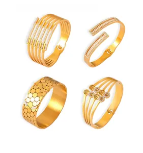 Collage of four gold-plated titanium steel bracelets with hollow and zircon designs