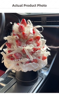 DIY strawberry bouquet with white ribbons, pearls, and feathers in a black gift box