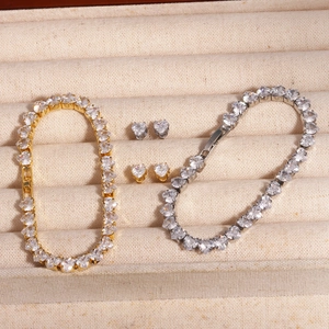 Gold and silver heart-shaped zircon tennis bracelets and matching stud earrings set