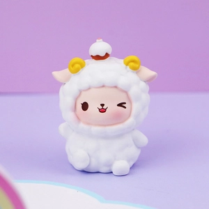 Close-up of cute white sheep figurine with dessert hat and smiling face decoration