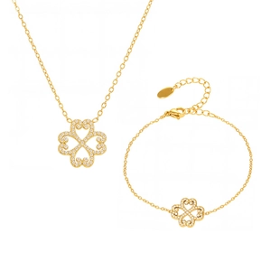Golden clover jewelry set with necklace and bracelet featuring hollow heart-shaped diamonds