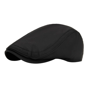 Béret classique en cuir noir pour hommes et femmes avec texture vintage et coutures soignées