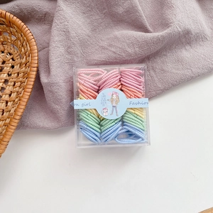 Macaron color elastic hair bands for kids in a transparent box with cartoon sleeve