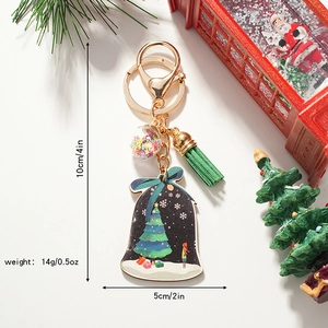 Weihnachtsglocke Holz-Schlüsselanhänger mit grüner Quaste und Stern-Glaskugel auf Weiß