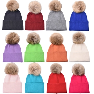 Winter knit beanies for kids featuring detachable faux fur pom-poms in 12 vibrant solid colors