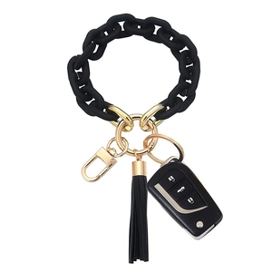 Fashion acrylic resin keychain bracelet with black tassels and golden hardware link