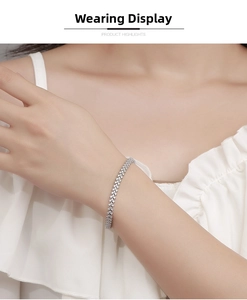 Detailed view of triple row moissanite tennis bracelet on wrist for an elegant look