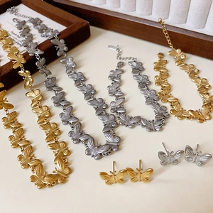 Vintage titanium steel butterfly necklace and earrings set in gold and silver finish