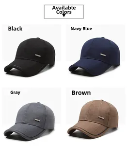 Detail view of four cotton baseball caps in neutral tones with side metal plate logo