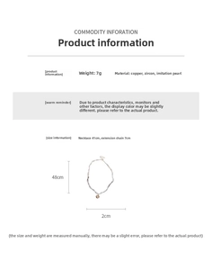 Detailed view of double-layer pearl necklace with starburst pendant and measurement dimensions