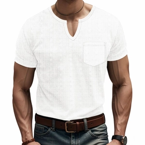 Detailed view of white V-neck T-shirt showing textured waffle fabric and chest pocket