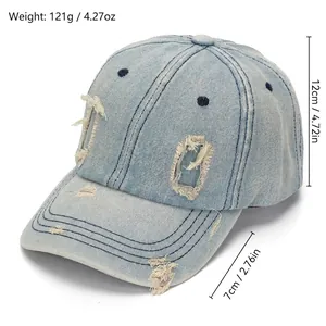 Distressed light blue washed denim baseball cap with vintage ripped holes for street style